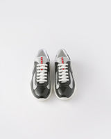 Sneakers Prada America’s Cup en cuir verni et tissu technique