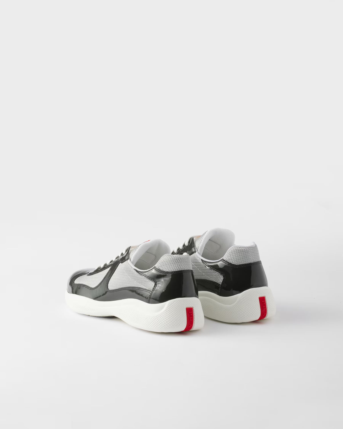 Sneakers Prada America’s Cup en cuir verni et tissu technique