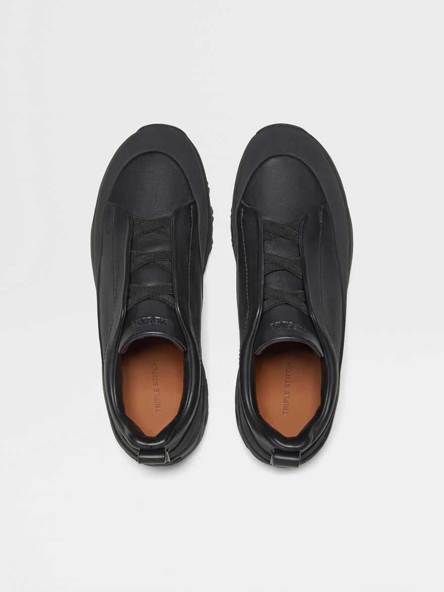 BASKETS TRIPLE STITCH™ MONTE EN CUIR NOIRES